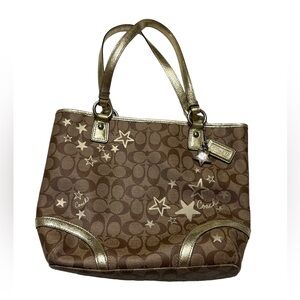 Coach purse with gold star details